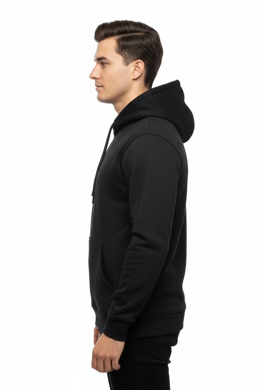 Man wearing a black hoodie best uqalitu hoodie  for men